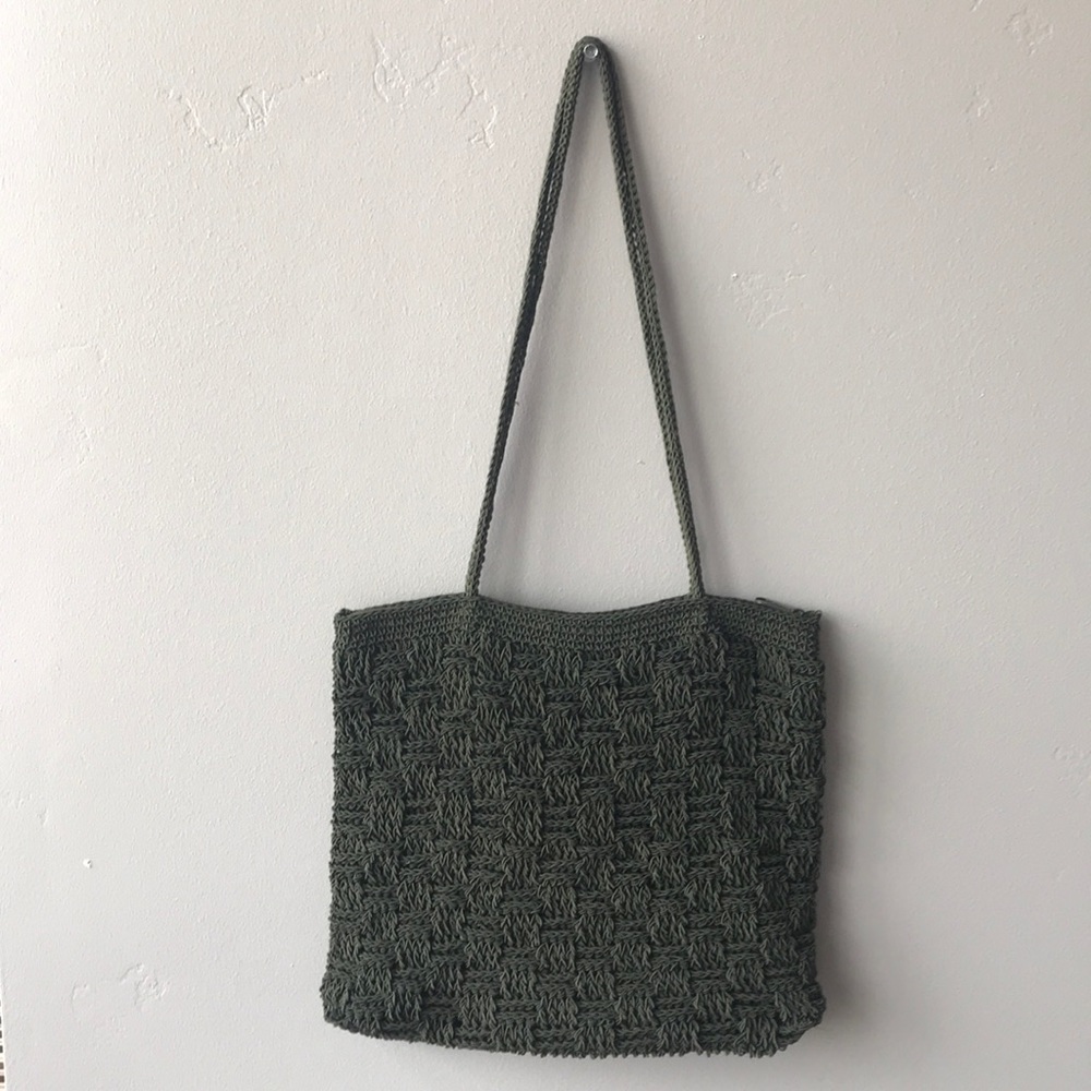 Crocheted army green purse.  No name.  Darn cute.